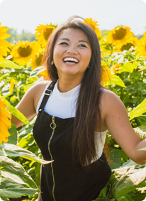 Woman In Sunflower Field
